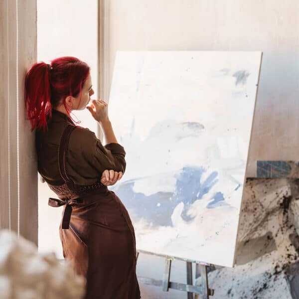 Young creative artist woman standing